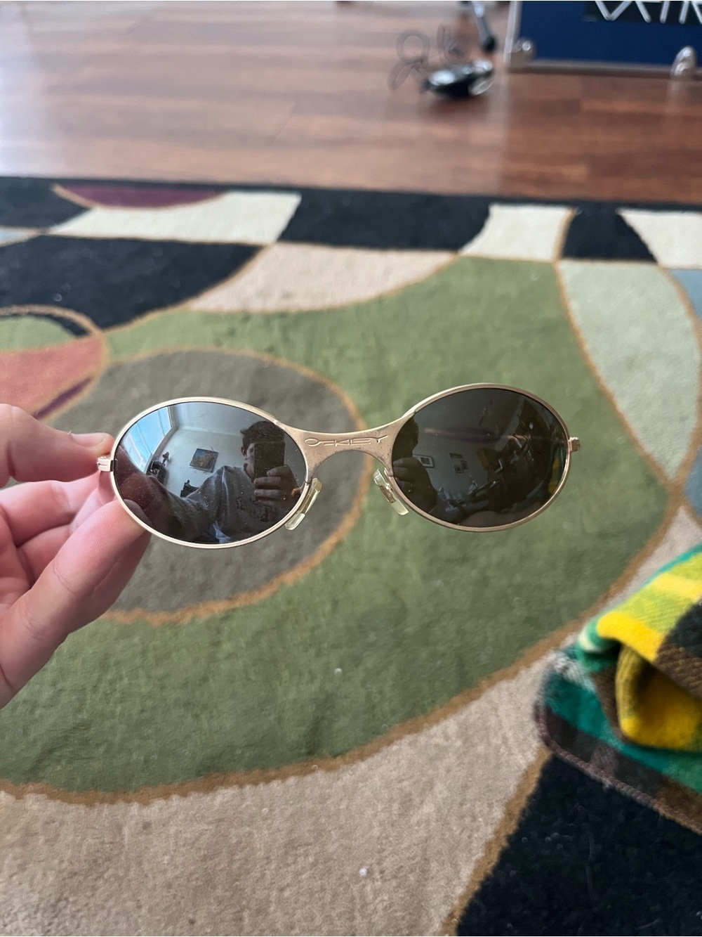 Vintage 90s Oakley E Wire Gold Oval Sunglasses with Dark Lenses